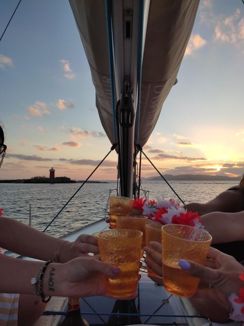 Alghero: Sunset Sailing Aperitif Experience - Watching the sun drop behind Alghero Bay