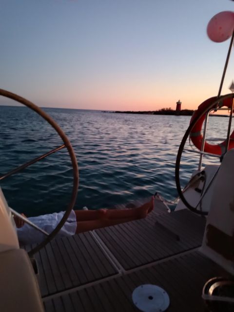 Alghero: Sunset Sailing Aperitif Experience - Who should book this Alghero sailing trip