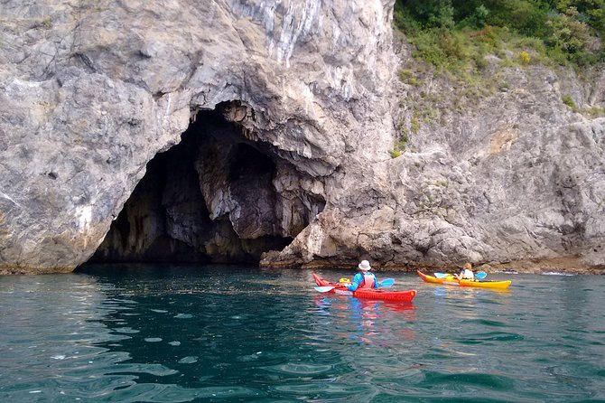 Amalfi Coast Kayak Tour: Explore Caves, Arches & Hidden Beaches - A beach break with swimming, snorkeling, and melon
