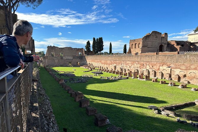 Ancient Rome Discovery: Colosseum, Forum, Palatine Guided Tour - Entering the Colosseum through the upper arches
