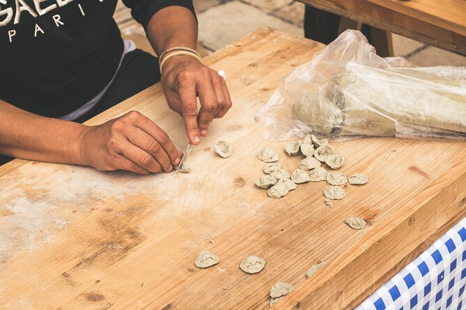 Bari Walking Tour with Pasta Experience - Piazza Ferrarese and a Roman road underfoot