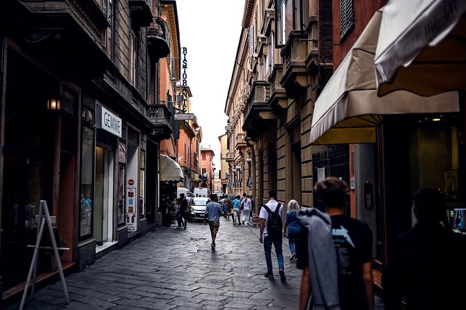Bologna Food & Market Tour with 6 Tastings, Pasta, Wines & More - Learning how to buy Parmigiano Reggiano