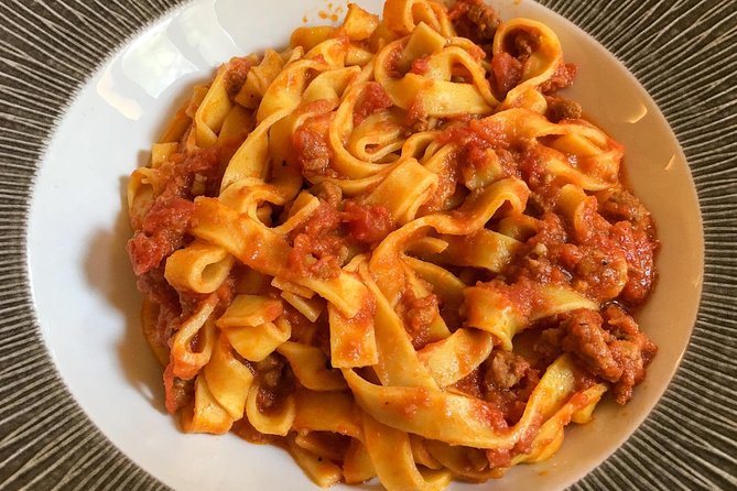 Bologna: Full meal Food Tour with Local Delights by Do Eat Better - First course: handmade pasta and Parmesan