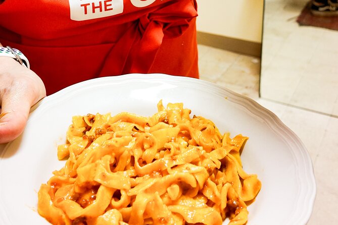 Bologna Local Pasta Cooking Class, Ragu, Spritz, Wine & Gelato - Sitting down to eat tagliatelle with San Giovese