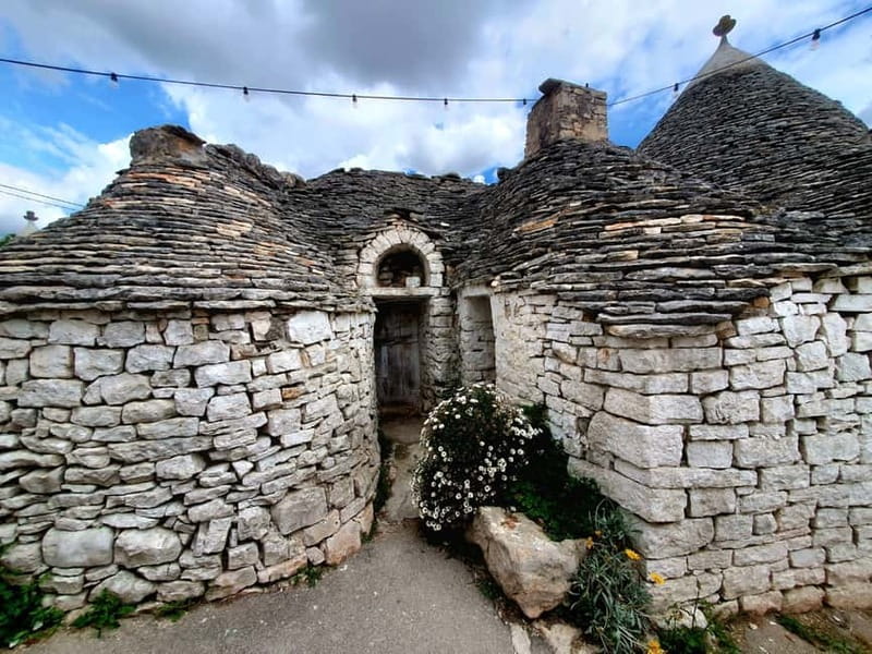 Brindisi: Alberobello, Locorotondo & Ostuni Tour with Brunch - Alberobello and the world of the trulli