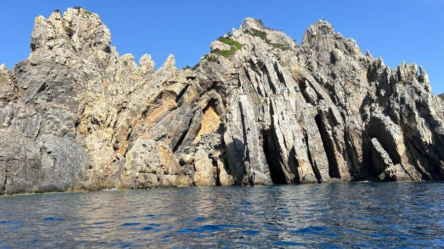 Buggerru: Half-Day Dinghy Tour of the Sardinian South Coast - Entering Grotta del Forno and Grotta Sardegna
