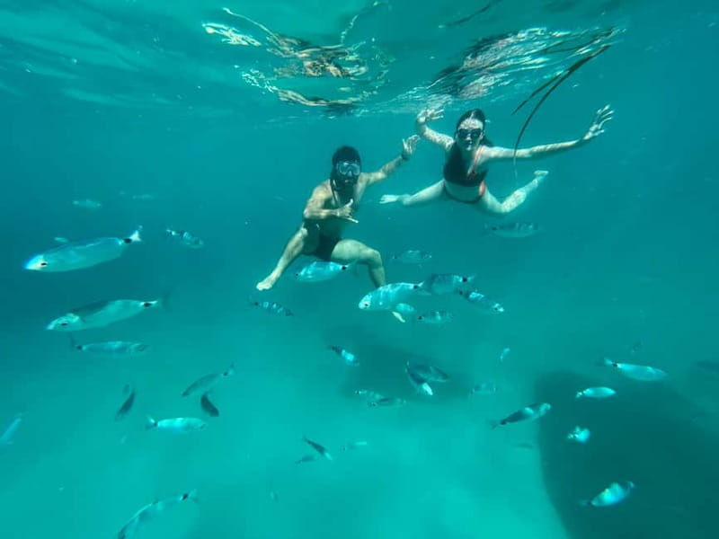 Cagliari: Boat Tour with 4 Swim Stops, Snorkeling & Prosecco - How the four swim stops are selected