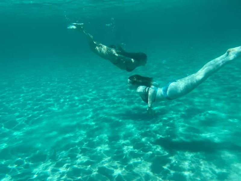 Cagliari: Boat Tour with 4 Swim Stops, Snorkeling & Prosecco - Cala Bernat and Cala Mosca: clear water close to the city