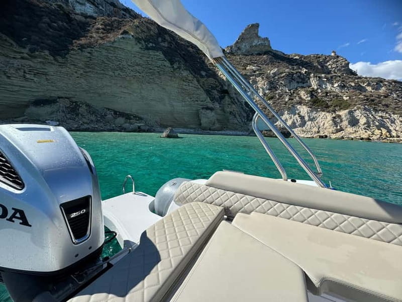 Cagliari: Boat Tour with 4 Swim Stops, Snorkeling & Prosecco - Cala Fighera and the cliffs of Devil’s Saddle