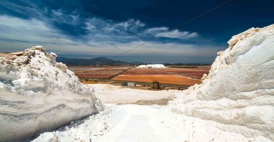 Cagliari: Conti Vecchi Salt Flats Train and Tour - Reaching the Conti Vecchi Saltworks