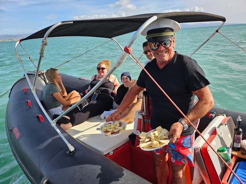 Cagliari:devil's saddle big cruise by boat drink & snack - A Sardinian aperitif with music on board