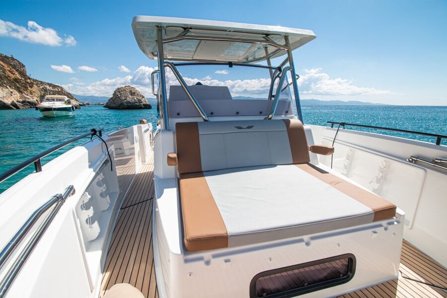 Cagliari: Luxury Motorboat Tour with 3 Swim Stops & Wine - Cruising past Poetto Beach and the Devil’s Saddle