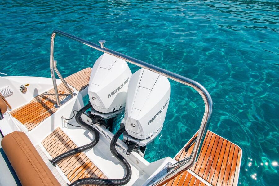 Cagliari: Luxury Motorboat Tour with 3 Swim Stops & Wine - The boat, the shade, and the wine