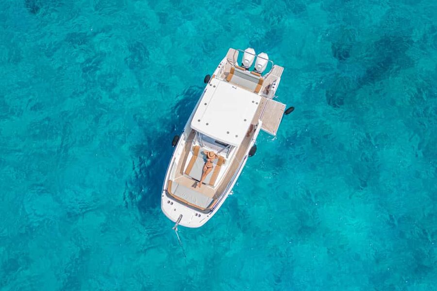 Cagliari: Luxury Motorboat Tour with 3 Swim Stops & Wine - Meeting the skipper at Marina Piccola