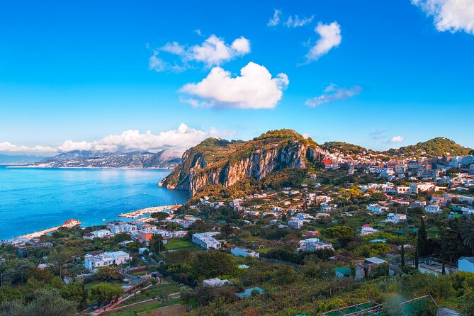 Capri Guided Boat Experience with Island Exploration and Transfer - White Grotto and the route back