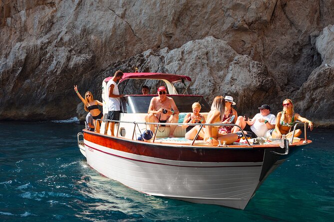 Capri Guided Boat Experience with Island Exploration and Transfer - Grotto water and a possible swim