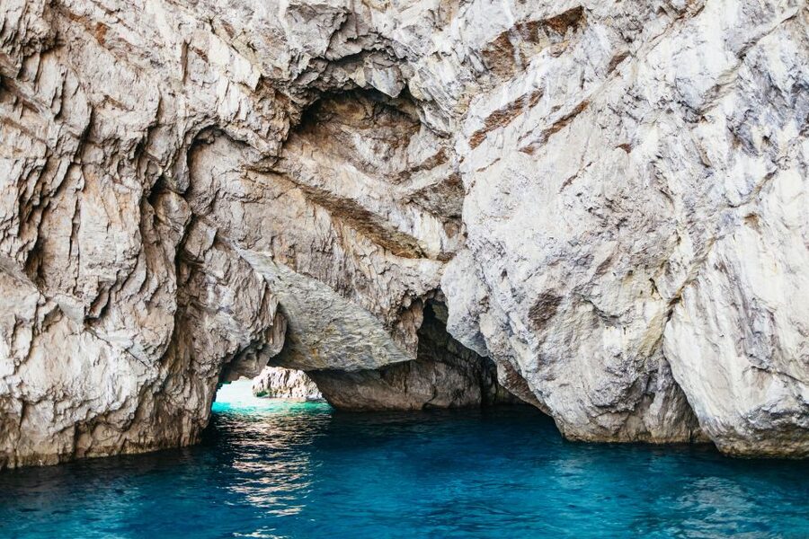 Capri: Island Boat Trip with Grottos - Punta Carena Lighthouse and the Baths of Tiberius