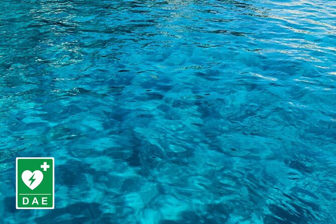 Catamaran tour stops bathing and snorkeling toast with prosecco - Cala Fighera, white rock, and fragile cliffs