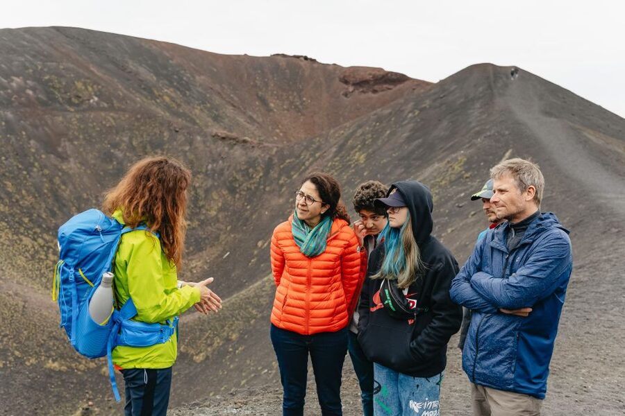 Catania: Mount Etna Morning or Sunset Day Trip with Tasting - Entering a lava flow cave with a helmet and flashlight