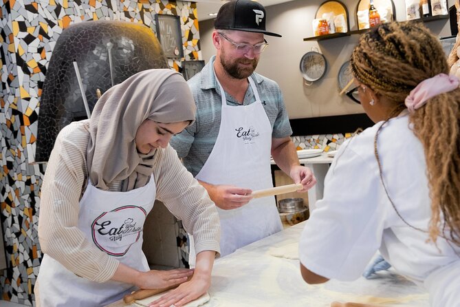 Cooking Class in the Heart of Rome: Pizza and Tiramisu Making - Group size, pace, and the instructors