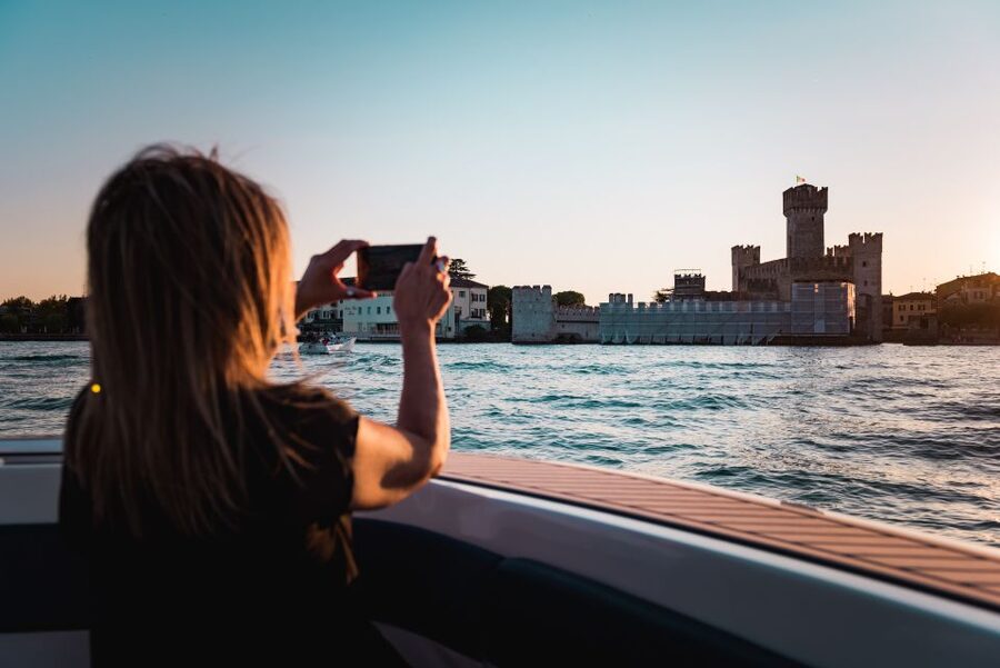 Desenzano del Garda: Sunset Boat Trip at Sunset with Drink - Why Sirmione looks best from the water