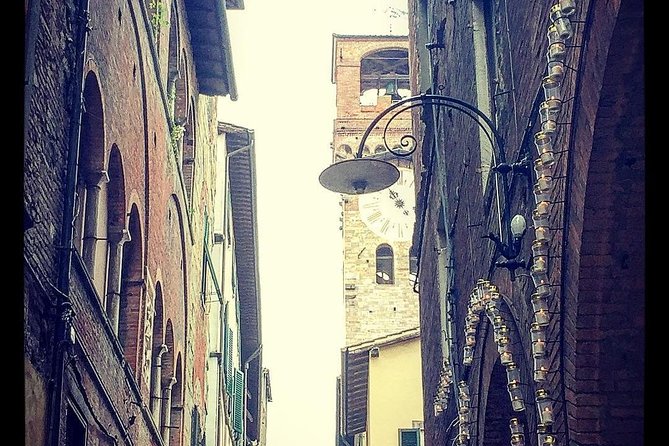 Discover Lucca’s Secrets on a Guided Walking Tour - Piazza Anfiteatro and the shape of ancient Lucca
