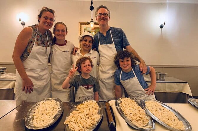 Florence: Cooking Class Pasta & Tiramisu Making Unlimited Wine - The instructors shape the mood