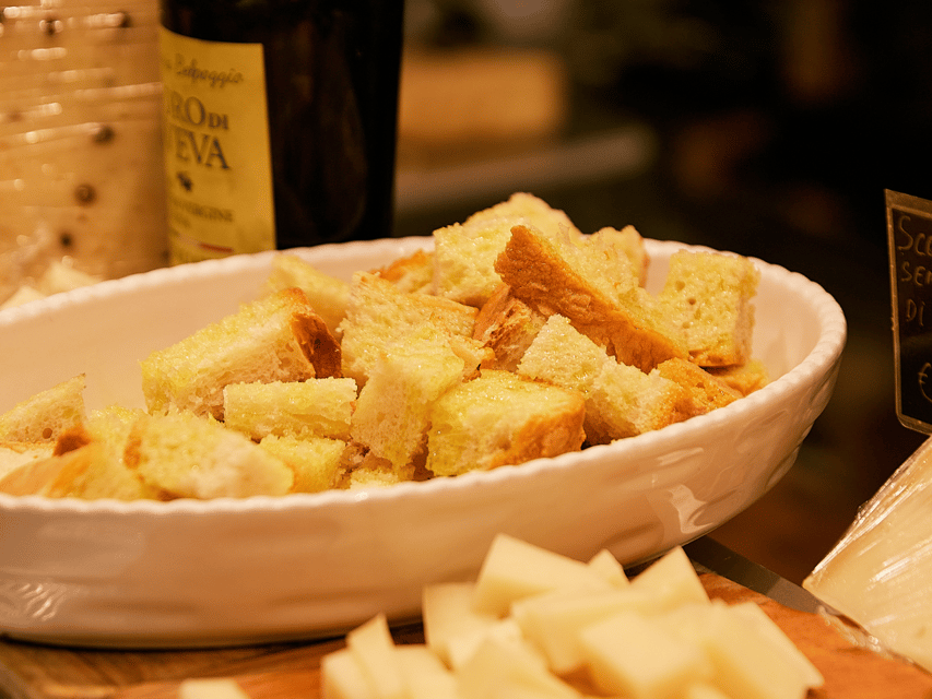 Florence: Cooking Class with Local Food Market Tour - Sitting down to eat what you made