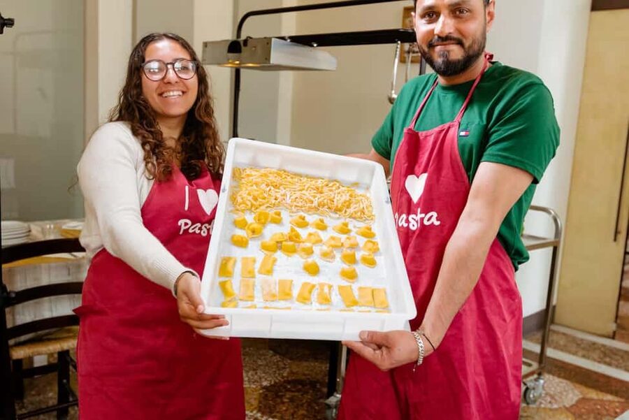 Florence: Pasta Class with Wine, Limoncello and Dessert - Sitting down to eat what you made