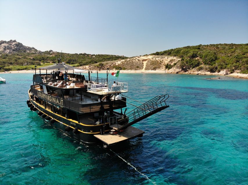 From Cannigione: La Maddalena Archipelago Boat Trip - Food, drinks, music, and useful onboard comforts