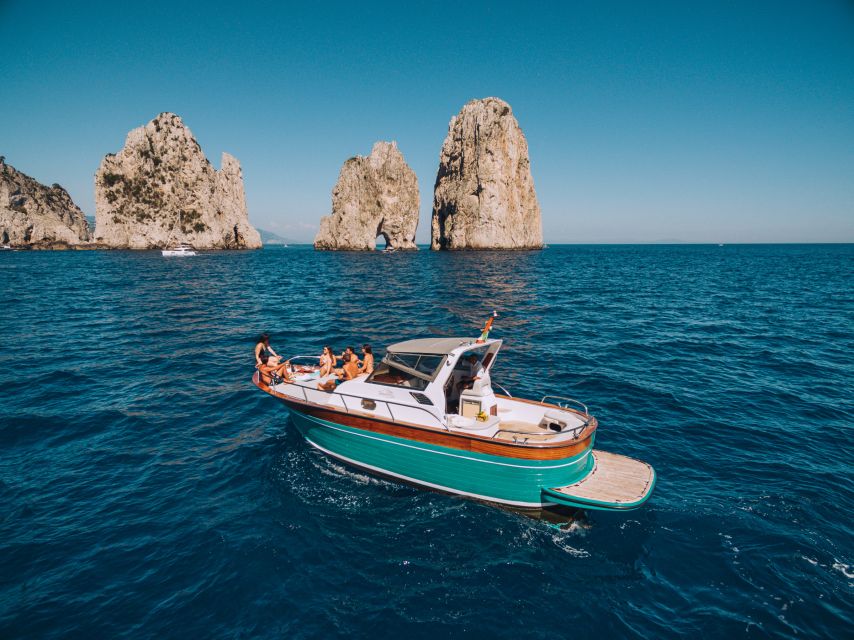 From Naples: Capri Boat Day Trip with Drinks - Seeing Capri from the traditional Sorrento boat