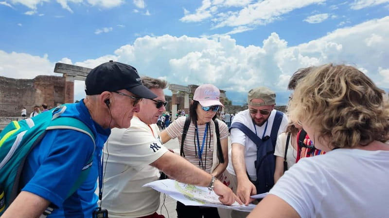 From Naples: Guided tour of Pompeii skip-the-line and round-trip train - Heat, rain, crowds, and walking