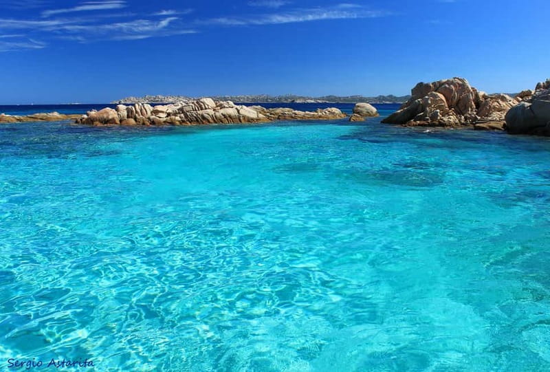 From Palau: 4 stops boat tour to La Maddalena archipelago - A longer beach break at Santa Maria