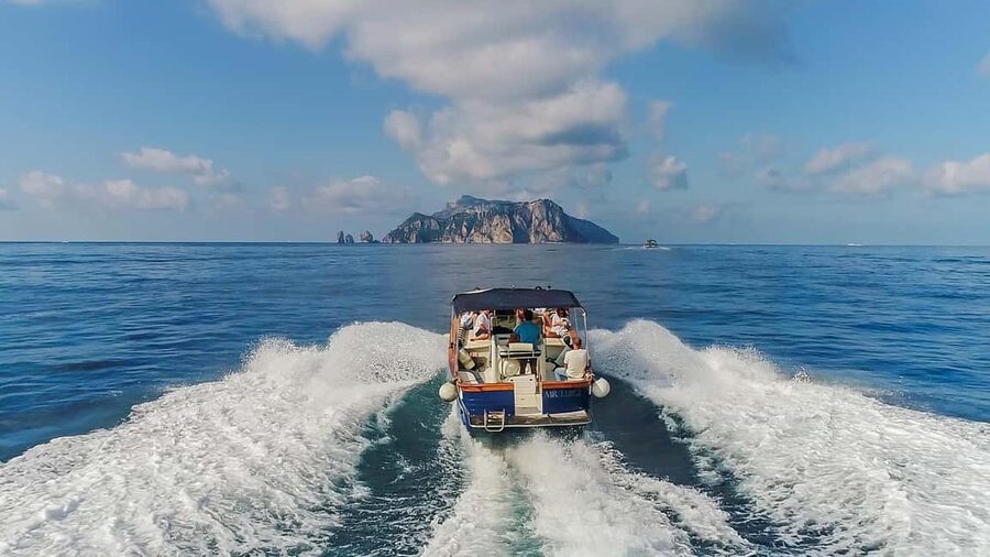 From Positano: Day trip to Capri - Group Tour by boat - Capri from the water: caves, arches, and cliffs