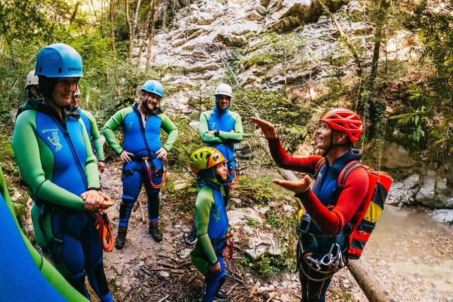 From Tignale, Lake Garda: Beginner-Friendly Canyoning Tour - Suiting up in neoprene, helmet, and harness