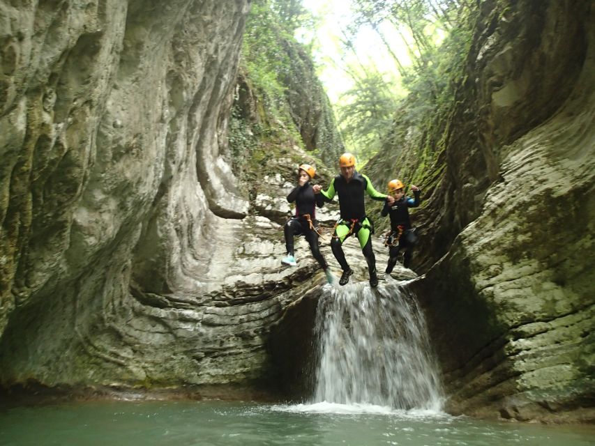 From Tignale, Lake Garda: Beginner-Friendly Canyoning Tour - The canyon route: jumps, rappels, and the 14-meter slide