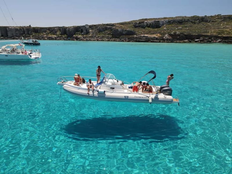 From Trapani: Egadi Islands Favignana & Levanzo Cruise - Bue Marino pairs swimming with old quarry walls