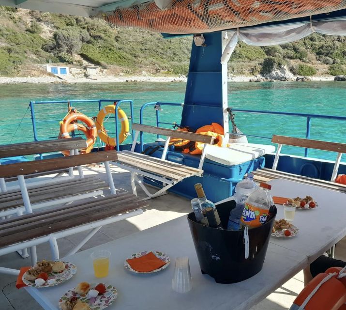 From Tropea: Capo Vaticano boat tour with snorkel & aperitif - The aperitif, snacks, and music on board