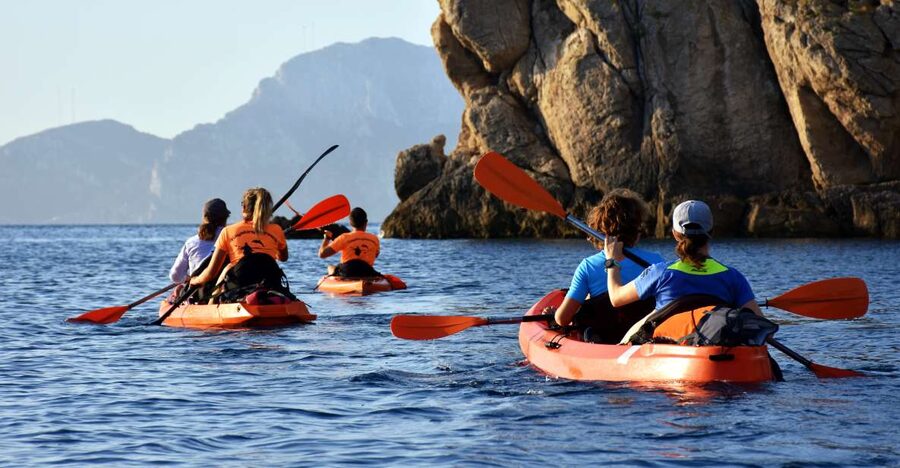 Golfo Aranci: Kayak Tour with Dolphins and Aperitif - The first paddle from Baracconi Beach