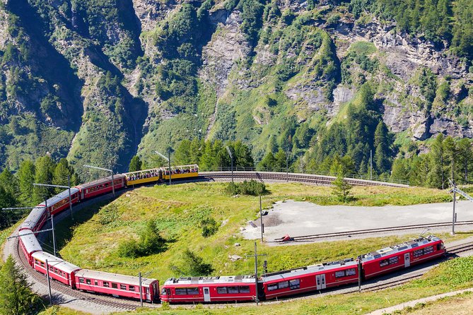 Intimate Small-Group Bernina UNESCO Scenic Train on Swiss Alps - Lunch and a change of countries in Tirano