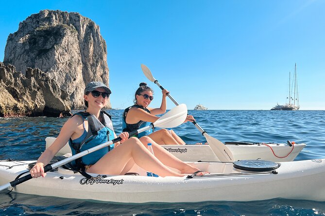 Kayak tour in Capri between caves and beaches. Photos included. - Paddling beneath Via Krupp