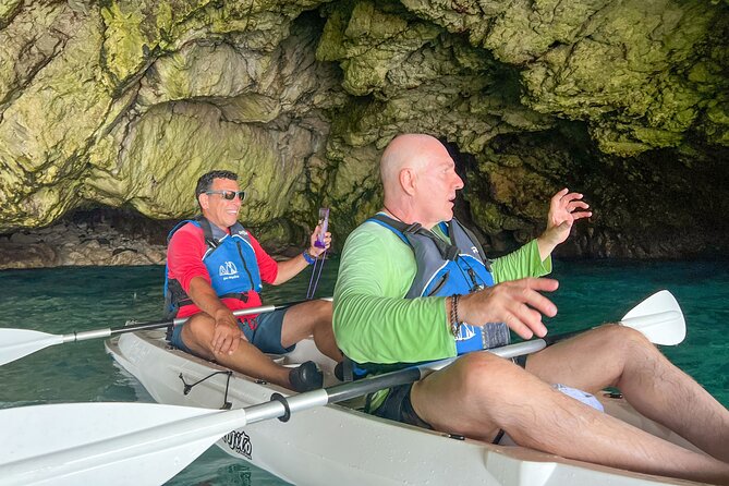 Kayak tour in Capri between caves and beaches. Photos included. - What to bring and what stays behind