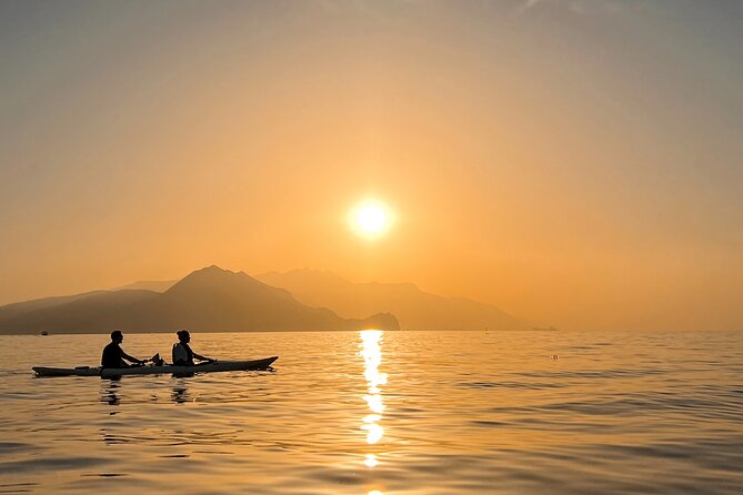 Kayak tour in Capri between caves and beaches. Photos included. - Weather, cancellations, and the best kind of participant