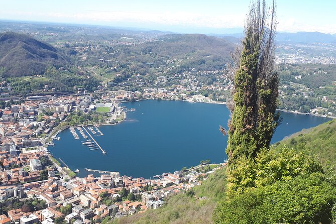 Lake Como and Switzerland: Bellagio & Lugano Tour With Boat Ride - Lugano: Swiss lakefront time with a city feel