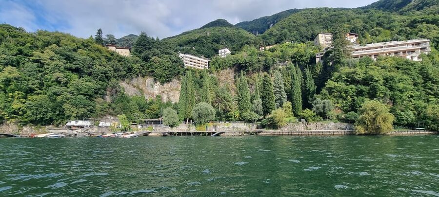Lake Como: Shared Boat Tour with Prosecco Aperitif - What the boat feels like in changing weather