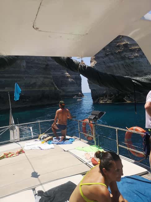 Lampedusa: Yacht excursion, swimming stops and typical lunch - Muro Vecchio, cliffs, and sea caves