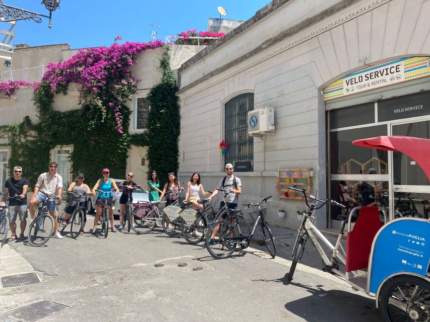 Lecce: City Highlights Guided Tour by Bike - Piazza Sant’Oronzo and the Roman amphitheater