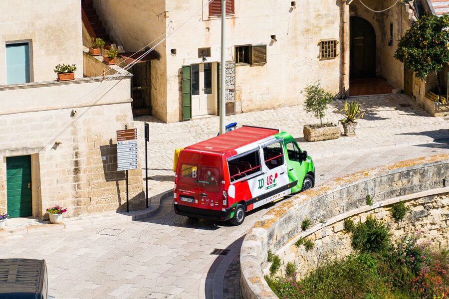 Matera: Open Top Bus Tour with Entrance to Casa Grotta - Piazza Vittorio Veneto and modern Matera