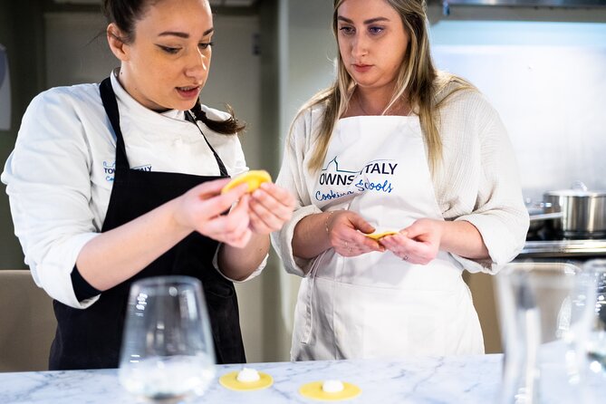 Milan Culinary Experience: Pasta & Gelato or Tiramisù Class - Making pasta above Milan’s central market