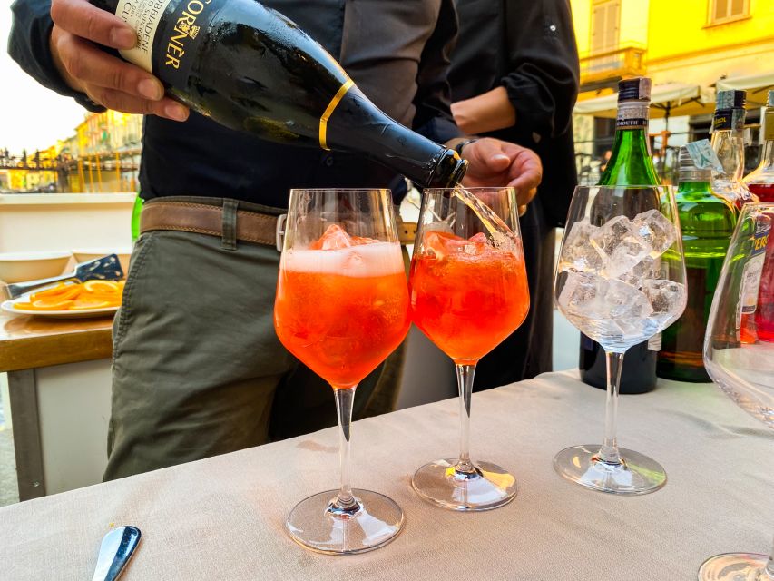 Milan: Navigli District Canal Boat Tour with Aperitivo - Drinks, finger food, and the Milanese aperitivo